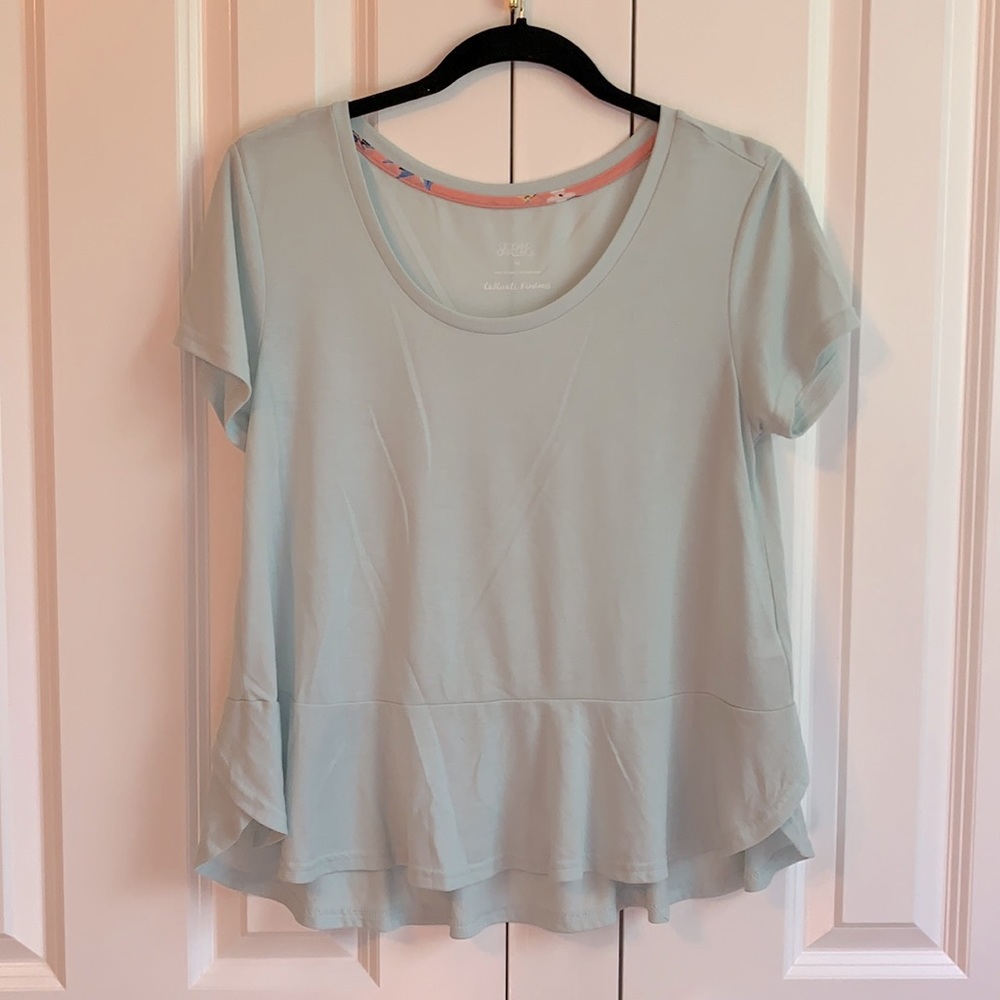 Aqua shirt and ruffled hem